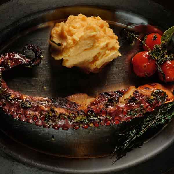 Grilled octopus with mashed potatoes and paprika | La Cabaña Argentina